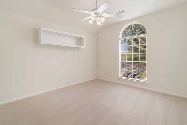 2113 Midway Ct, League City, TX 77573 - unfurnished room with light colored carpet, a ceiling fan, baseboards, and vaulted ceiling