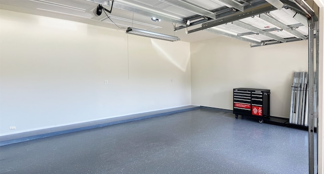 2113 Midway Ct, League City, TX 77573 - garage featuring baseboards