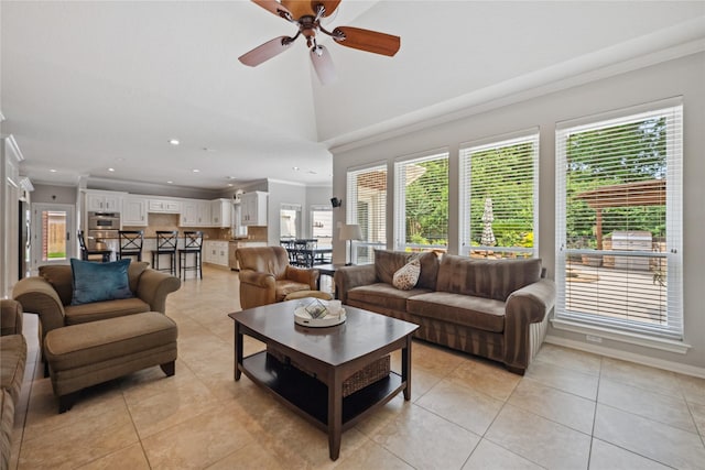 5902 Cardinal Creek Way, Kingwood, TX 77345 - living room featuring light tile patterned floors, ornamental molding, ceiling fan, and recessed lighting