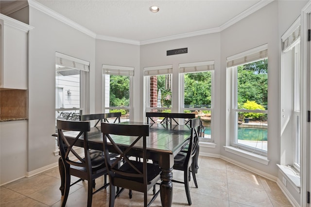 5902 Cardinal Creek Way, Kingwood, TX 77345 - dining room with light tile patterned flooring, crown molding, baseboards, and recessed lighting