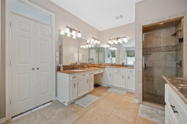5902 Cardinal Creek Way, Kingwood, TX 77345 - full bath featuring vanity, a shower stall, and tile patterned floors