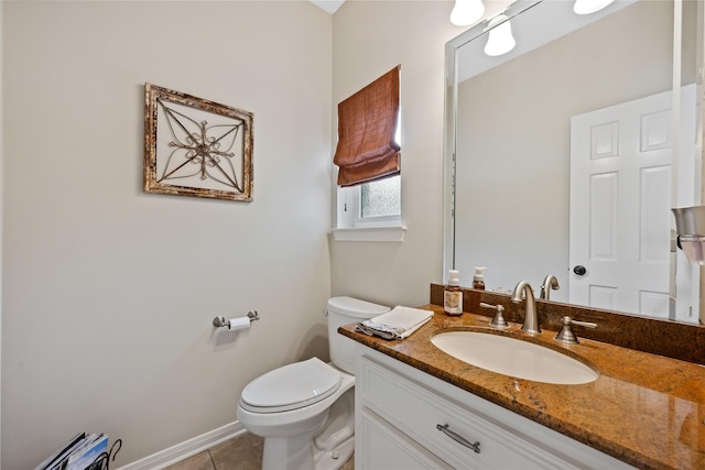 5902 Cardinal Creek Way, Kingwood, TX 77345 - bathroom with vanity, toilet, tile patterned flooring, and baseboards