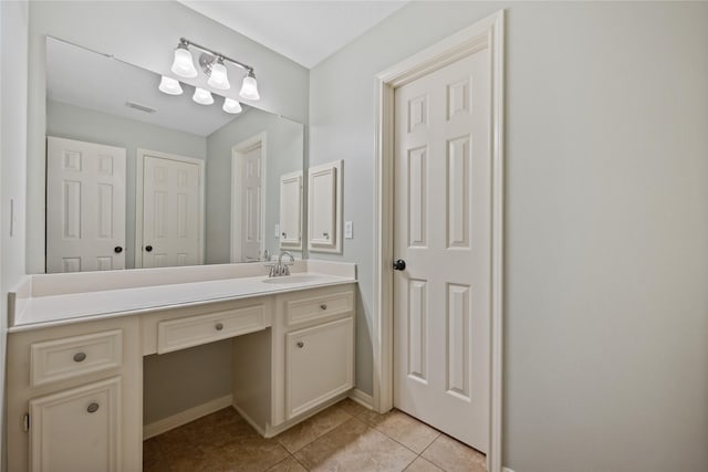 5902 Cardinal Creek Way, Kingwood, TX 77345 - bathroom with tile patterned flooring, vanity, and baseboards
