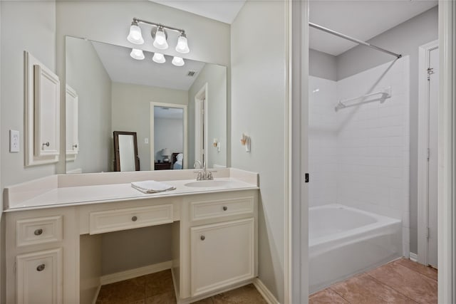 5902 Cardinal Creek Way, Kingwood, TX 77345 - bathroom featuring vanity, shower / bath combination, tile patterned flooring, and ensuite bathroom