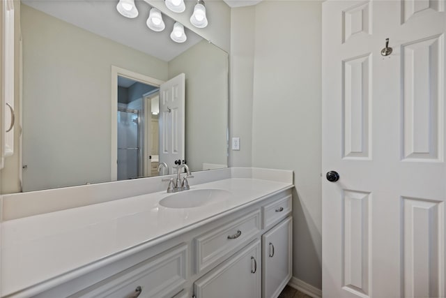 5902 Cardinal Creek Way, Kingwood, TX 77345 - bathroom featuring vanity, a shower stall, and baseboards