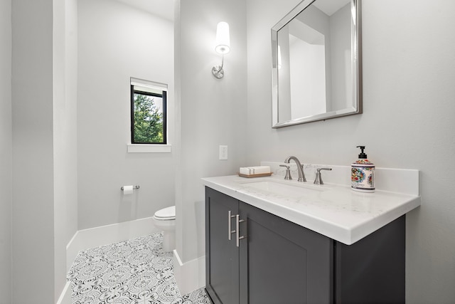 1610 Woodcrest Dr, Houston, TX 77018 - half bath with toilet, vanity, baseboards, and tile patterned flooring