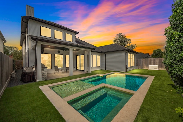 1610 Woodcrest Dr, Houston, TX 77018 - rear view of house with an in-ground hot tub, a chimney, a patio area, and a ceiling fan