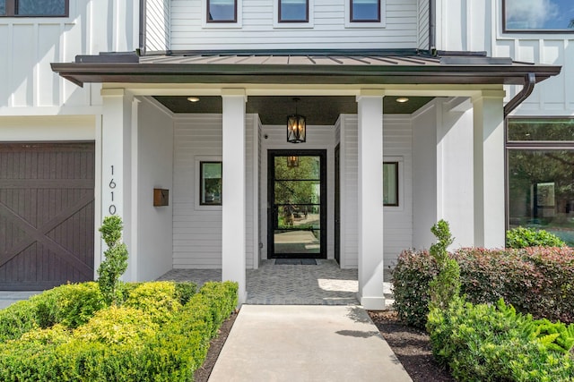 1610 Woodcrest Dr, Houston, TX 77018 - property entrance with a standing seam roof, board and batten siding, covered porch, and metal roof