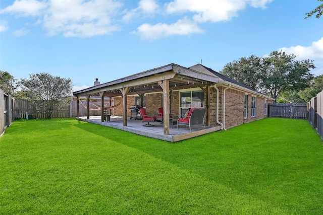4506 Brazos Bend Dr, Pearland, TX 77584 - back of property featuring brick siding and a patio area