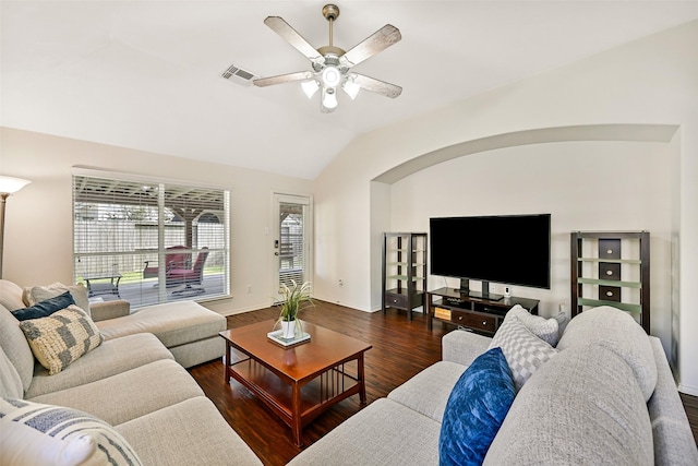 4506 Brazos Bend Dr, Pearland, TX 77584 - living room with lofted ceiling, ceiling fan, wood finished floors, baseboards, and arched walkways