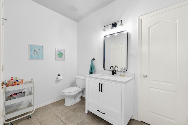 2602 Shady Acres Ct, Houston, TX 77008 - bathroom featuring vanity, toilet, baseboards, and tile patterned floors