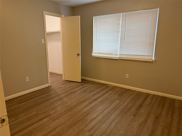 12819 Labelle Ln, Houston, TX 77015 - spare room with baseboards and wood finished floors