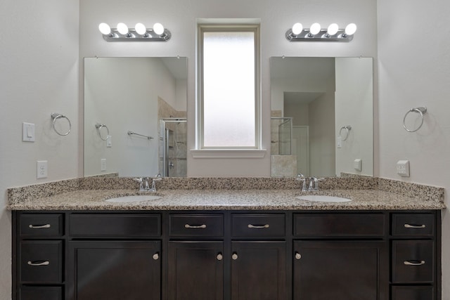 253 Dove Meadow Dr, Conroe, TX 77384 - full bath featuring a shower stall and double vanity