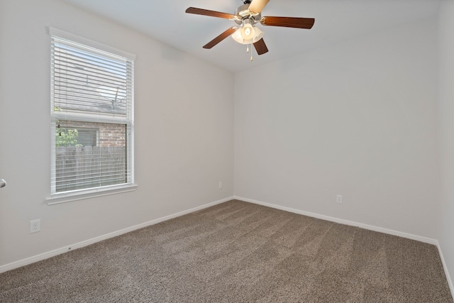253 Dove Meadow Dr, Conroe, TX 77384 - spare room with carpet floors, a ceiling fan, and baseboards
