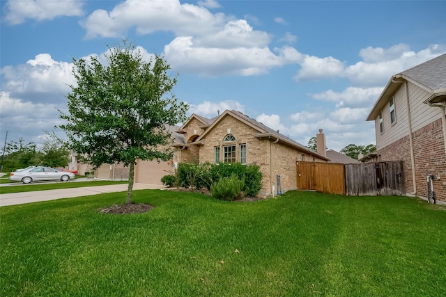 5339 Glenfield Spring Ln, Spring, TX 77389 - view of front of property with brick siding, concrete driveway, and a garage