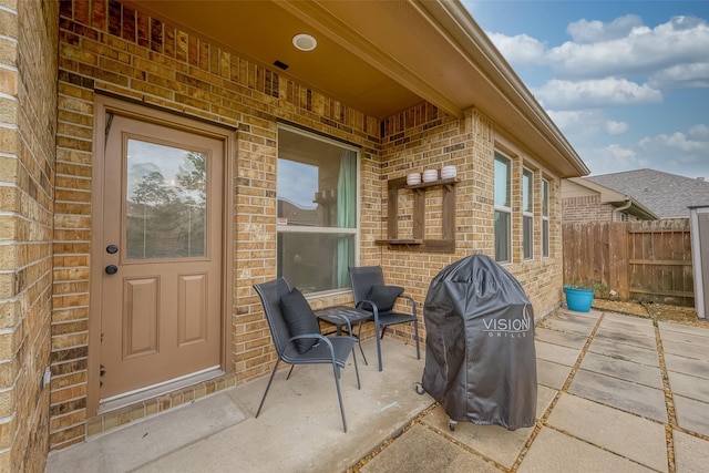 5339 Glenfield Spring Ln, Spring, TX 77389 - entrance to property featuring brick siding and a patio area