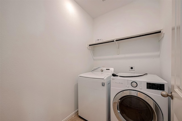 5339 Glenfield Spring Ln, Spring, TX 77389 - laundry area featuring washing machine and dryer
