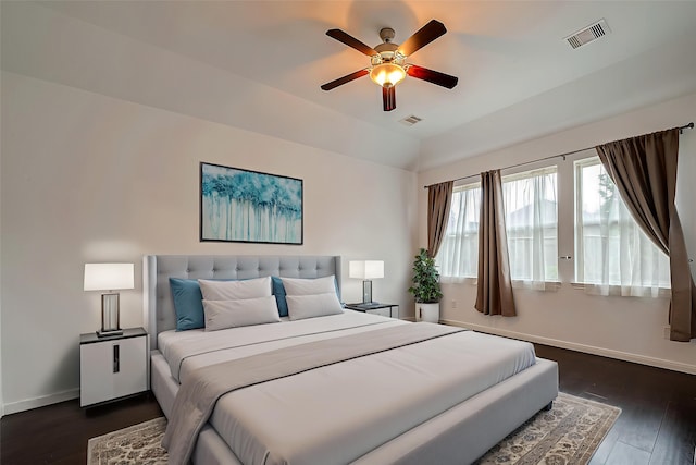 5339 Glenfield Spring Ln, Spring, TX 77389 - bedroom with baseboards, dark wood-style flooring, a ceiling fan, and vaulted ceiling