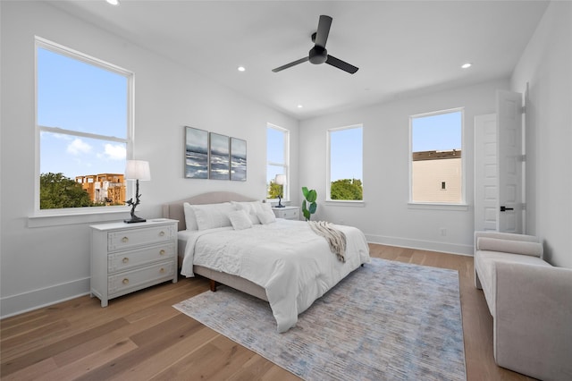 5705 Dolores St Unit B, Houston, TX 77057 - bedroom with light wood-style flooring, recessed lighting, and ceiling fan