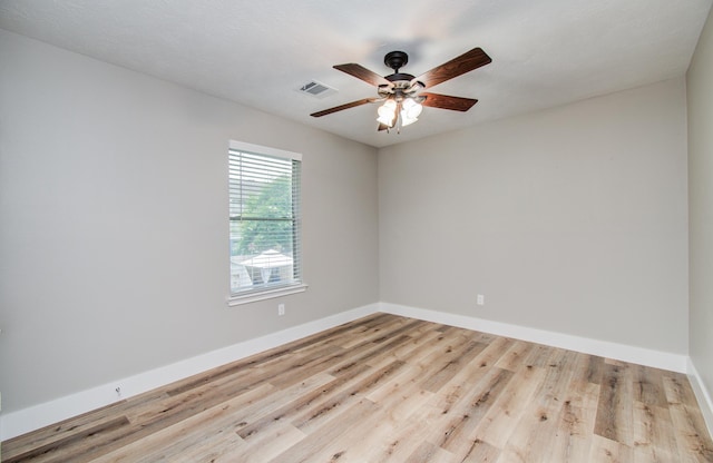 5238 Timber Quail Dr, Humble, TX 77346 - spare room featuring wood finished floors, ceiling fan, and baseboards