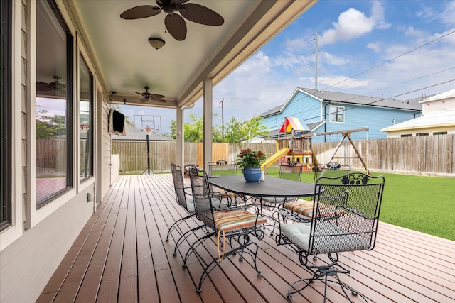 1346 Thornton Rd, Houston, TX 77018 - deck with ceiling fan, a playground, and outdoor dining space