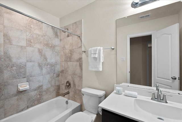 2114 Sand Ridge Dr, Texas City, TX 77568 - bathroom featuring toilet, vanity, and bathtub / shower combination