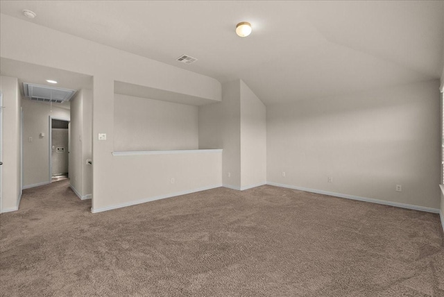 2114 Sand Ridge Dr, Texas City, TX 77568 - carpeted empty room with attic access, baseboards, a smoke detector, and lofted ceiling