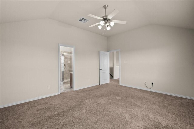 2114 Sand Ridge Dr, Texas City, TX 77568 - unfurnished bedroom with vaulted ceiling, light carpet, baseboards, connected bathroom, and ceiling fan