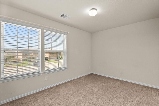 2114 Sand Ridge Dr, Texas City, TX 77568 - carpeted empty room with baseboards