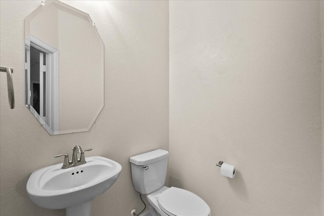 2114 Sand Ridge Dr, Texas City, TX 77568 - bathroom with a sink and toilet