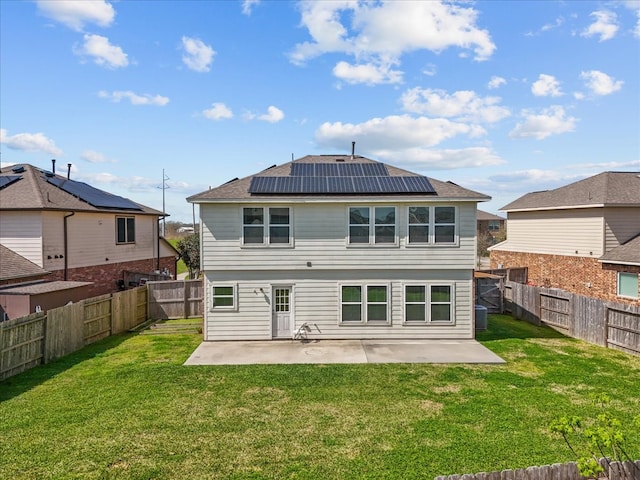 2114 Sand Ridge Dr, Texas City, TX 77568 - rear view of property with a patio, solar panels, a shingled roof, and cooling unit