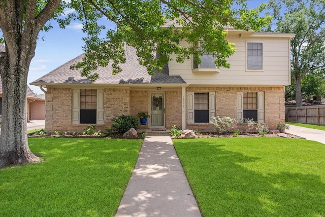 2639 Valley Field Dr, Sugar Land, TX 77479 - view of front facade with brick siding and a shingled roof
