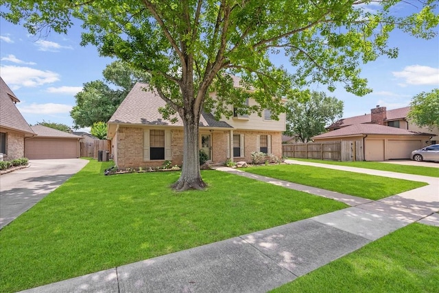 2639 Valley Field Dr, Sugar Land, TX 77479 - view of front of house with brick siding, a garage, and central air condition unit
