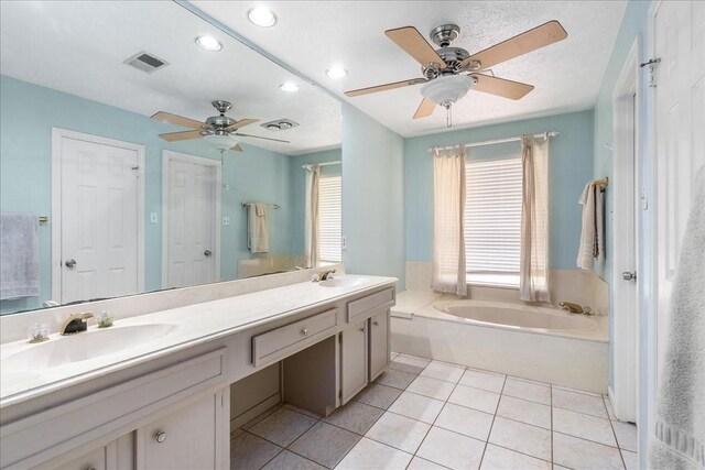 2639 Valley Field Dr, Sugar Land, TX 77479 - full bathroom with double vanity, a ceiling fan, a bath, recessed lighting, and tile patterned flooring