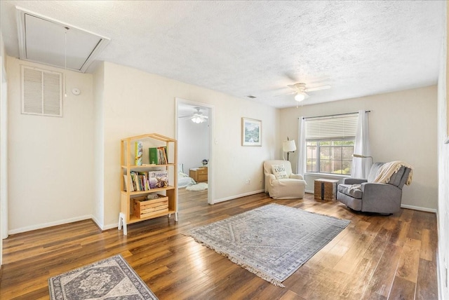 2639 Valley Field Dr, Sugar Land, TX 77479 - sitting room with attic access, ceiling fan, a textured ceiling, wood finished floors, and baseboards