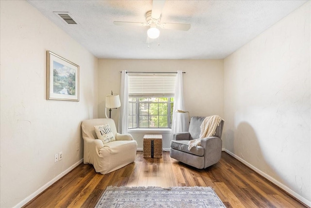 2639 Valley Field Dr, Sugar Land, TX 77479 - living area featuring wood finished floors, a ceiling fan, baseboards, and a textured ceiling