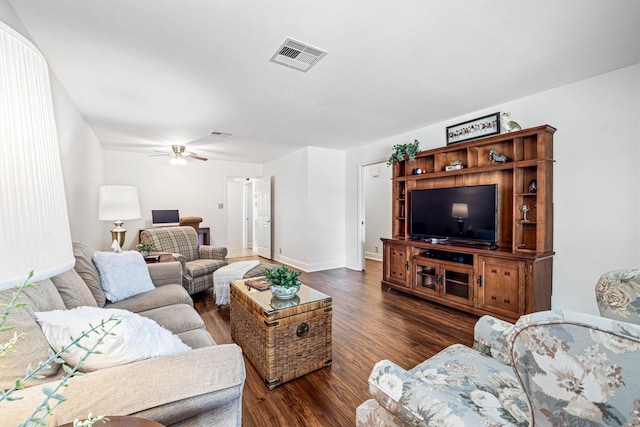 2510 Cypress Dr, Galveston, TX 77551 - living area featuring wood finished floors, baseboards, and a ceiling fan
