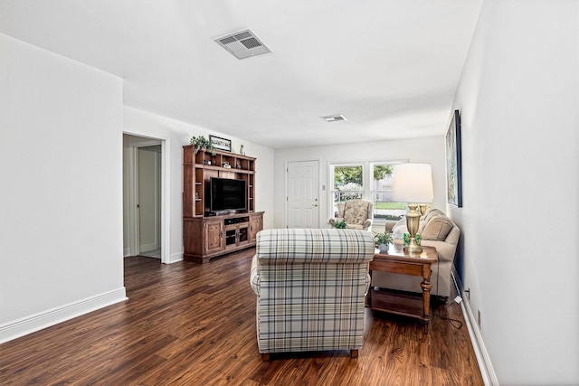 2510 Cypress Dr, Galveston, TX 77551 - living area with dark wood-style flooring and baseboards