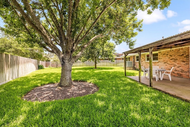 2510 Cypress Dr, Galveston, TX 77551 - view of yard with a patio