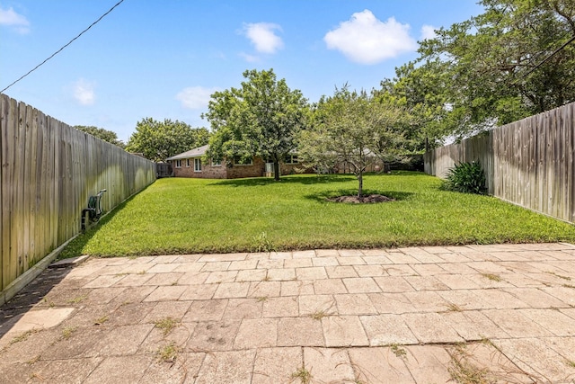 2510 Cypress Dr, Galveston, TX 77551 - view of yard featuring a patio