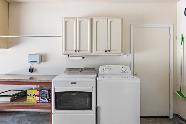 2510 Cypress Dr, Galveston, TX 77551 - laundry area with separate washer and dryer and cabinet space