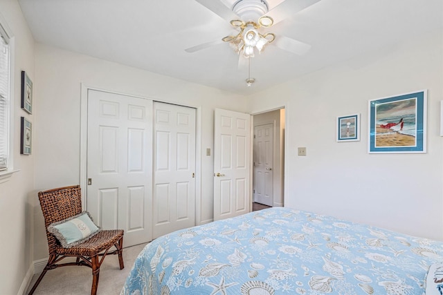 2510 Cypress Dr, Galveston, TX 77551 - bedroom with carpet floors, a closet, baseboards, and ceiling fan