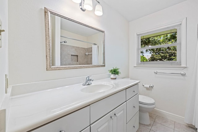 2510 Cypress Dr, Galveston, TX 77551 - full bathroom featuring vanity, toilet, a shower with shower curtain, baseboards, and tile patterned floors
