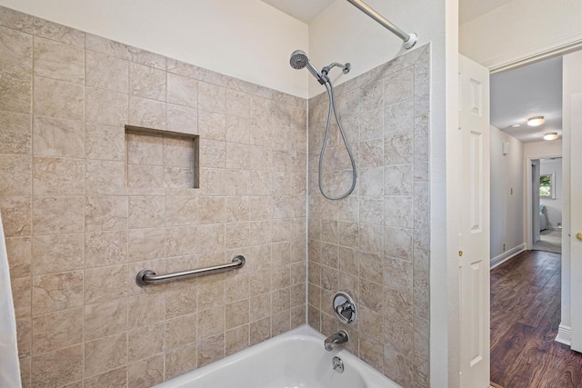 2510 Cypress Dr, Galveston, TX 77551 - full bathroom featuring shower / tub combination and wood finished floors