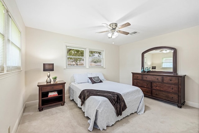 2510 Cypress Dr, Galveston, TX 77551 - bedroom featuring light colored carpet, baseboards, and ceiling fan
