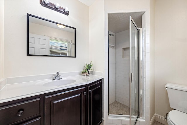 2510 Cypress Dr, Galveston, TX 77551 - full bathroom with toilet, vanity, and a stall shower