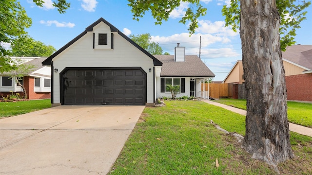 24006 Scrivener Ln, Katy, TX 77493 - view of front facade featuring a chimney, an attached garage, concrete driveway, and a shingled roof