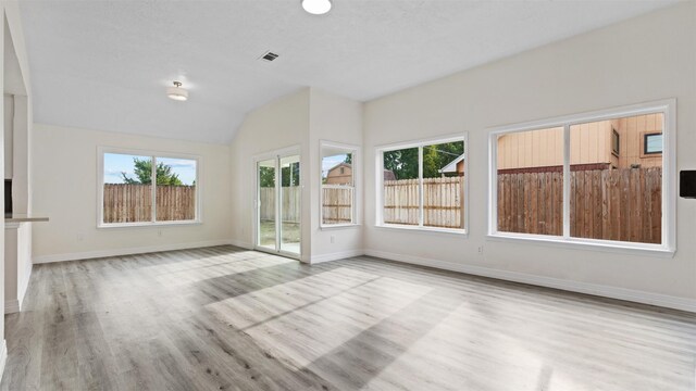 24006 Scrivener Ln, Katy, TX 77493 - unfurnished sunroom with healthy amount of natural light and lofted ceiling