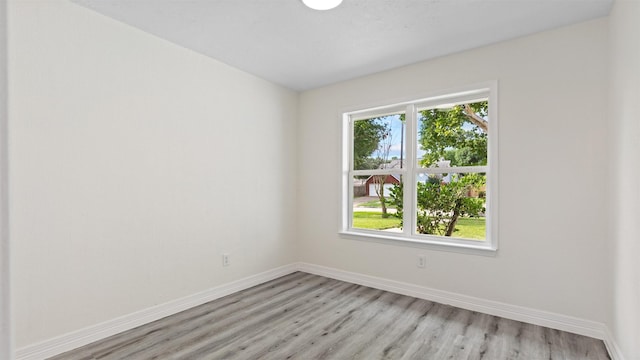 24006 Scrivener Ln, Katy, TX 77493 - spare room with baseboards and light wood finished floors