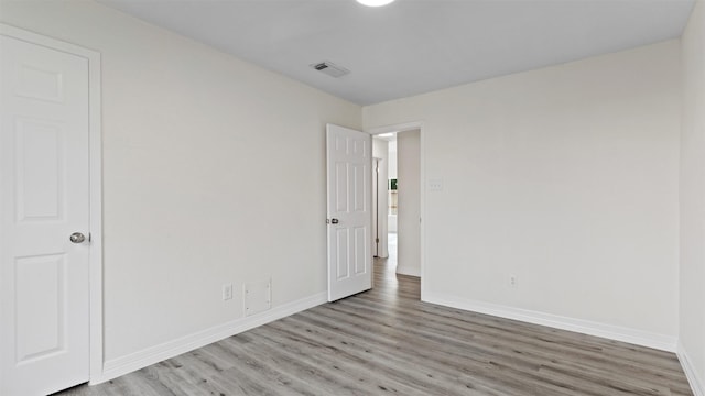 24006 Scrivener Ln, Katy, TX 77493 - unfurnished room with light wood finished floors and baseboards